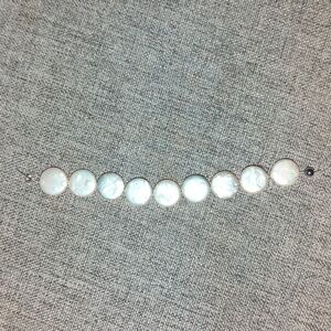 Nine Beautiful White Shell Disk Beads.